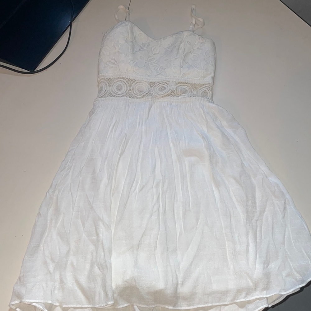 White BXC dress with adjustable straps and back zipper